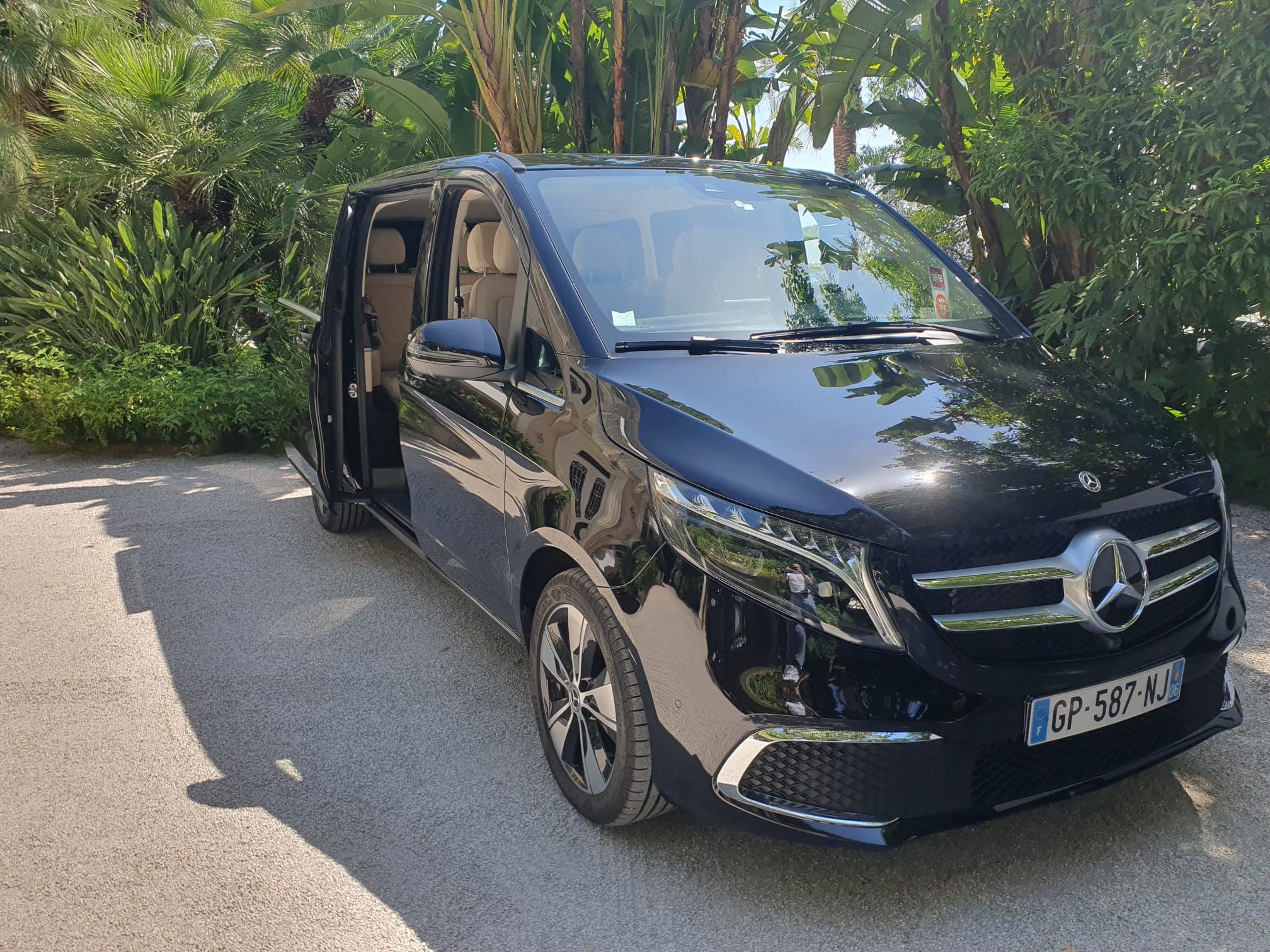 Mercedes V-Class van with its door open on arrival
